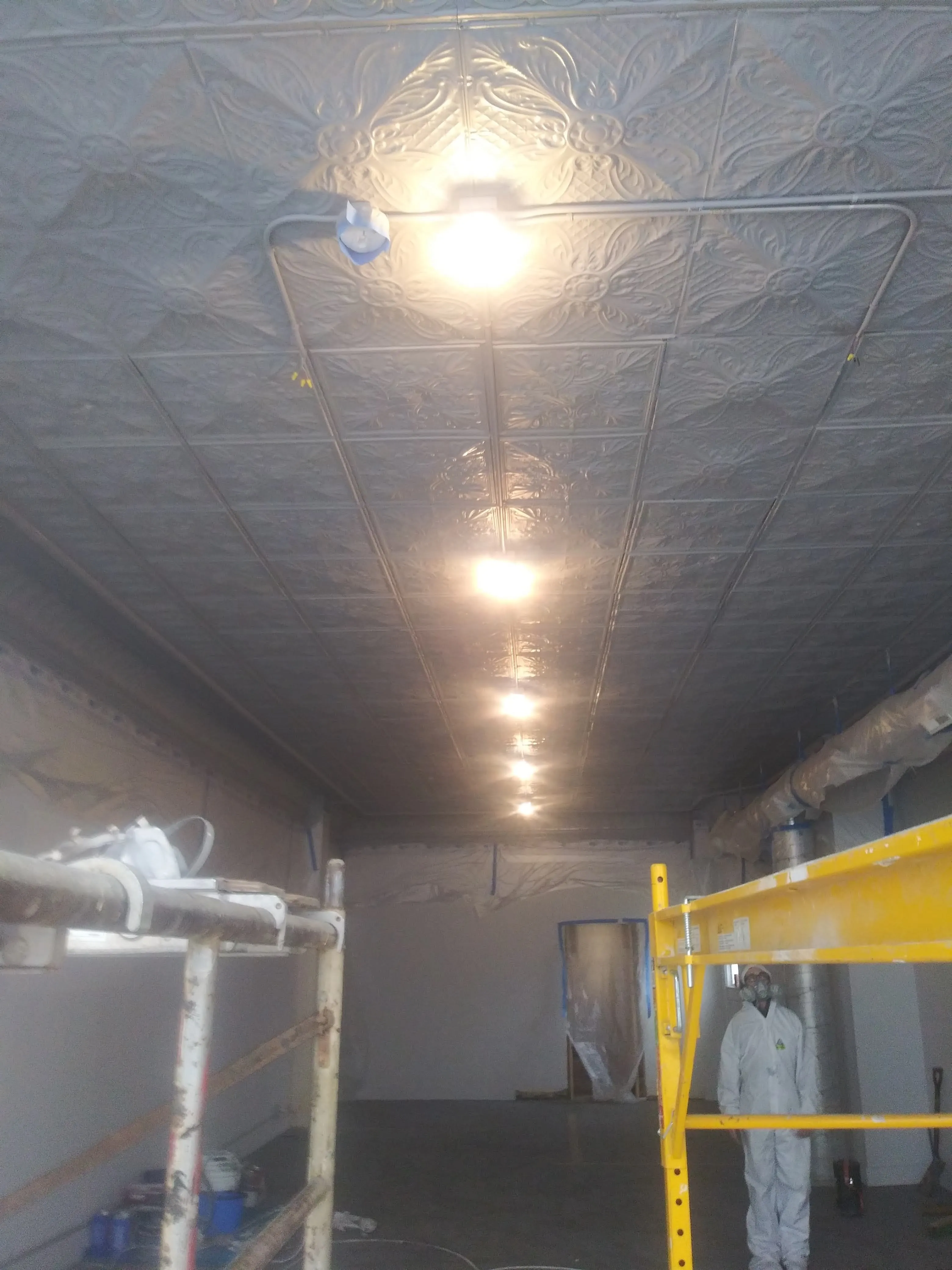Tin ceiling during restoration