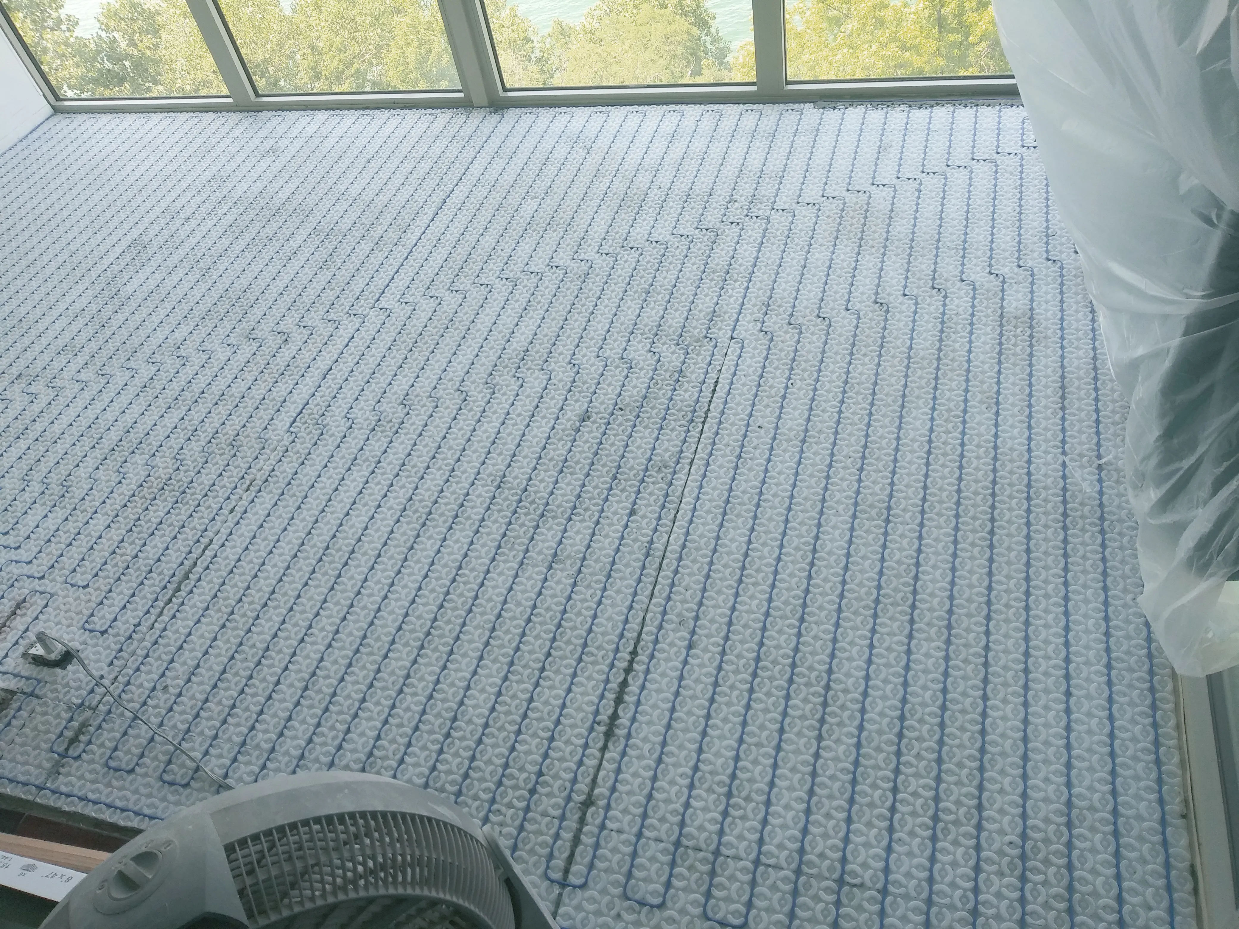 Heated tile floor during install